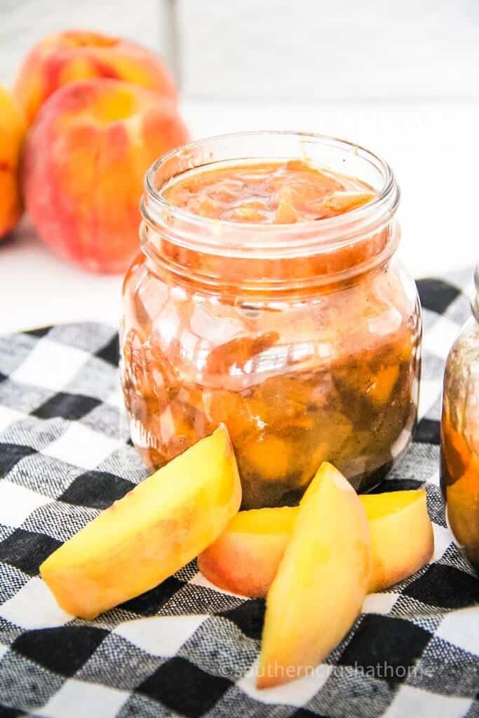 peach jam in a mason jar