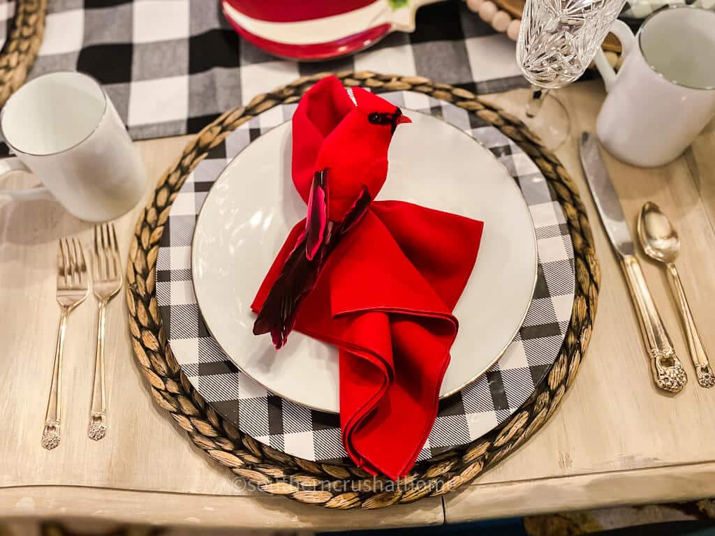 red cardinal on dinner napkin