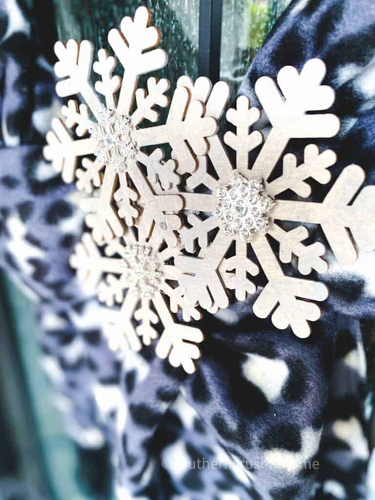 up close view of snowflakes on winter wreath