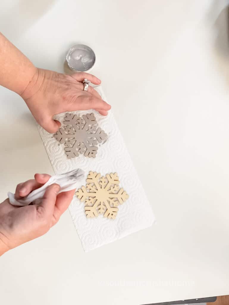 painting wooden snowflakes