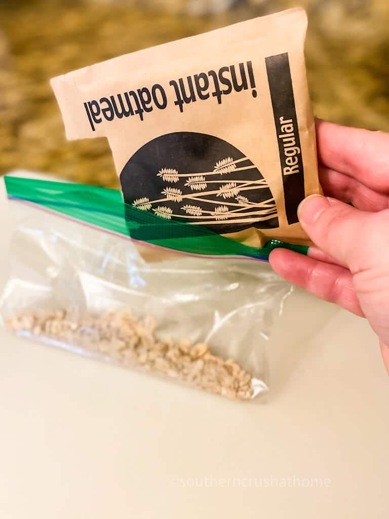 adding oats to baggie for reindeer food