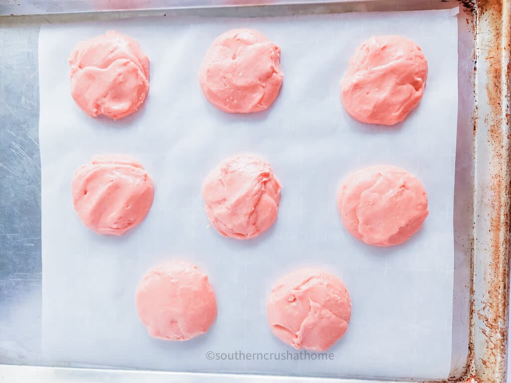 raw cake cookies on sheet pan