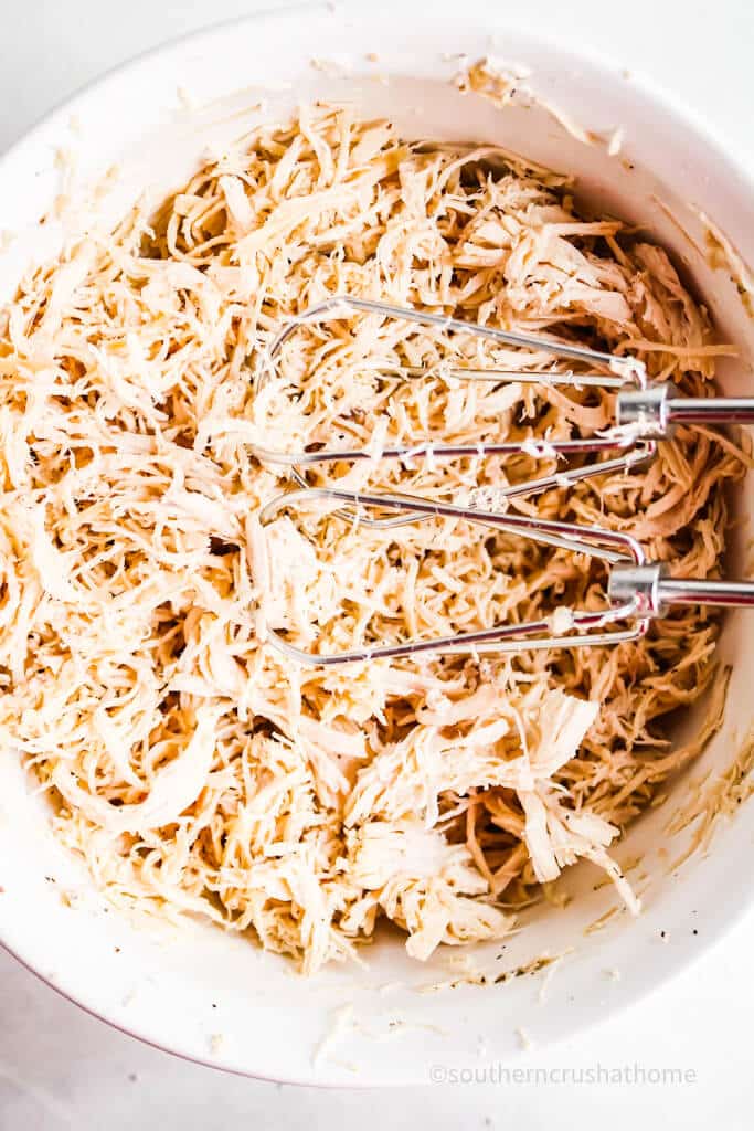 beaters in shredded chicken bowl