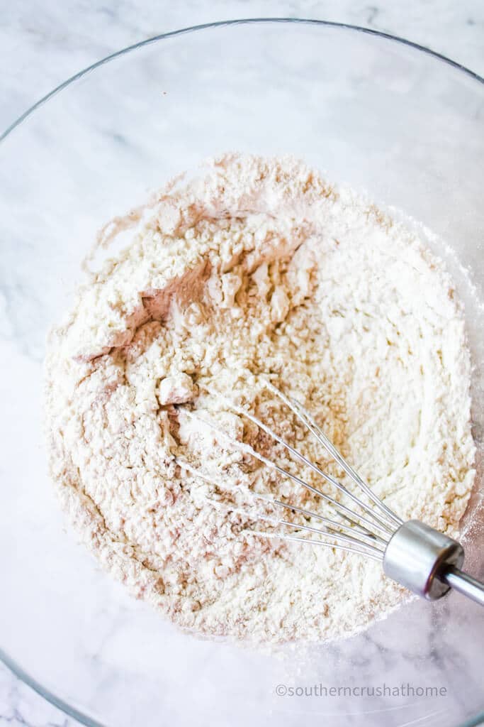 mixing dry ingredients for garlic bread