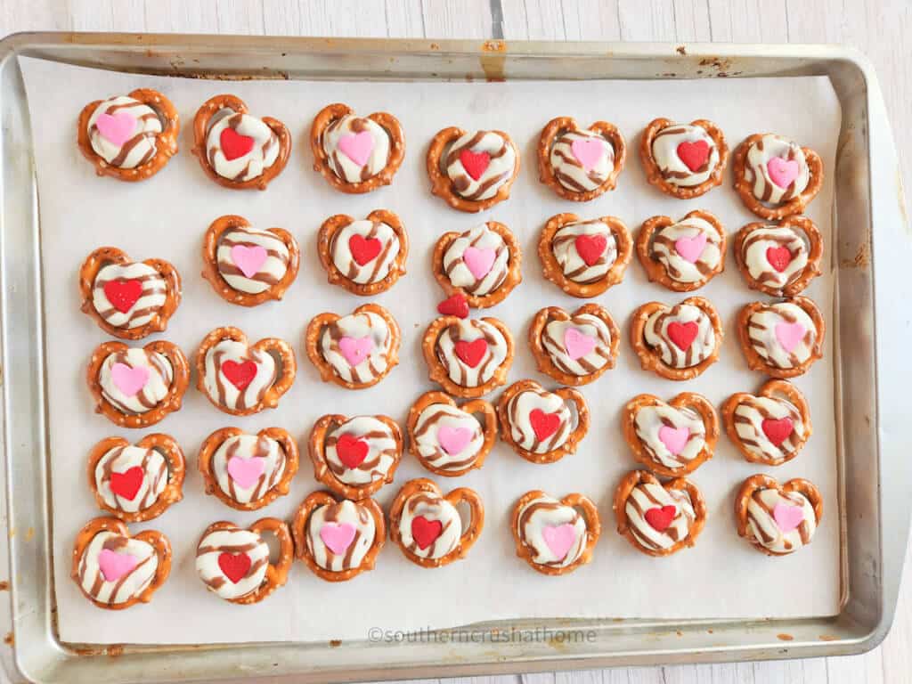 red and pink hearts on top of valentines treats