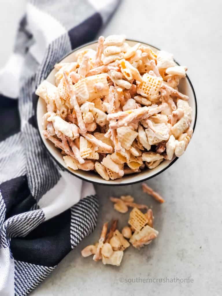 black and white check towel and bowl of chex mix