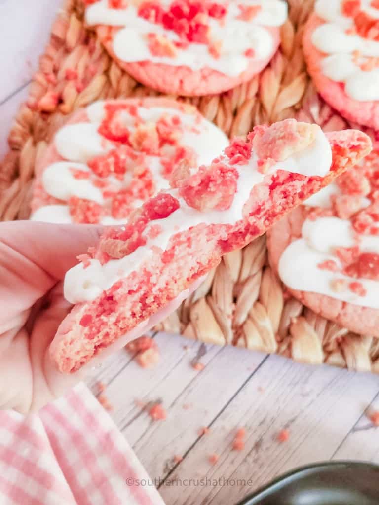 bite out of copycat crumbl strawberry crunch cookie