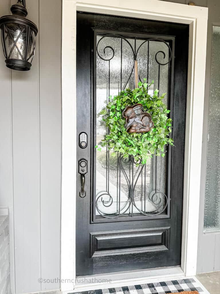 front door with bunny easter wreath