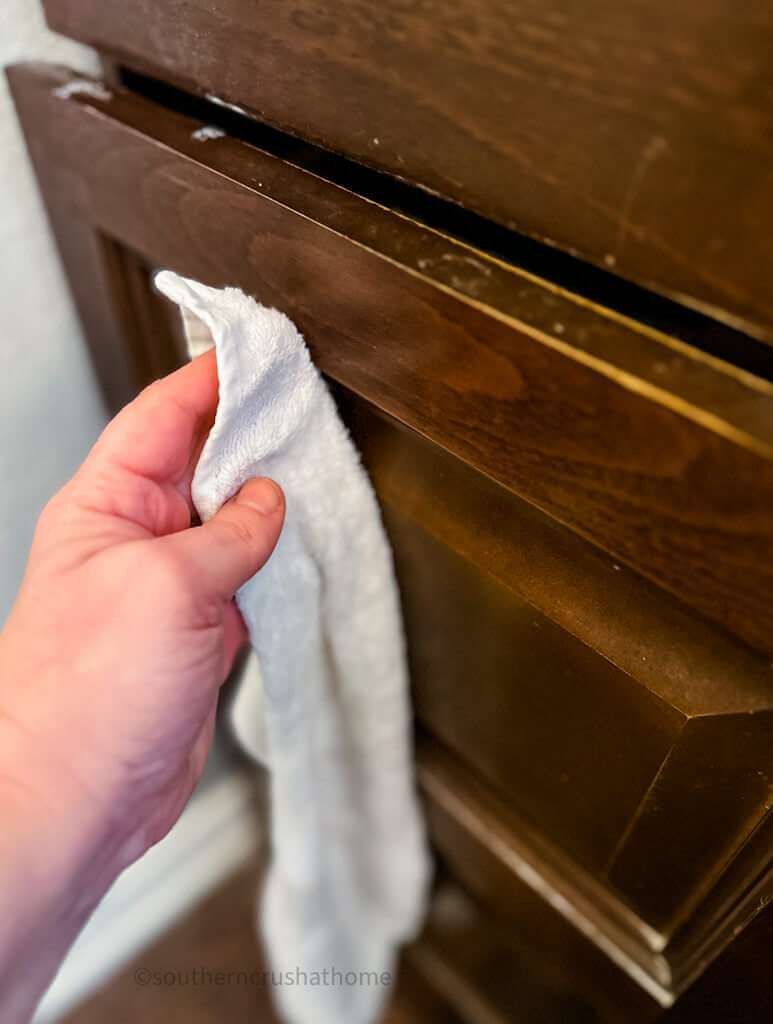 wiping down drawer face