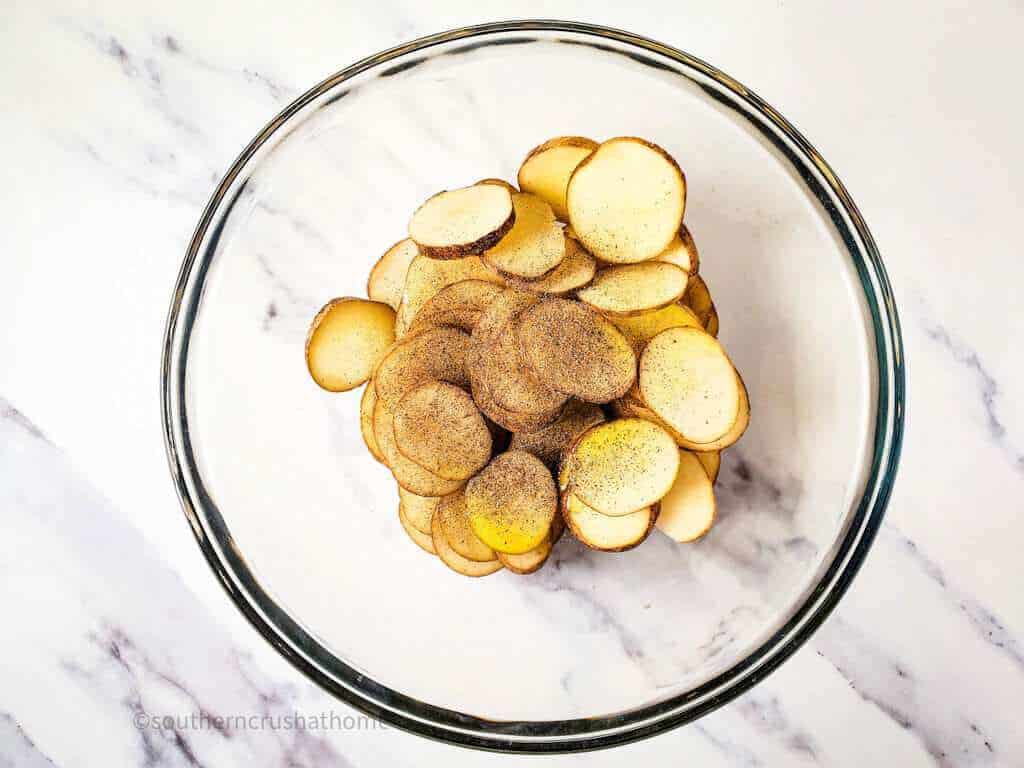 pepper on potato slices