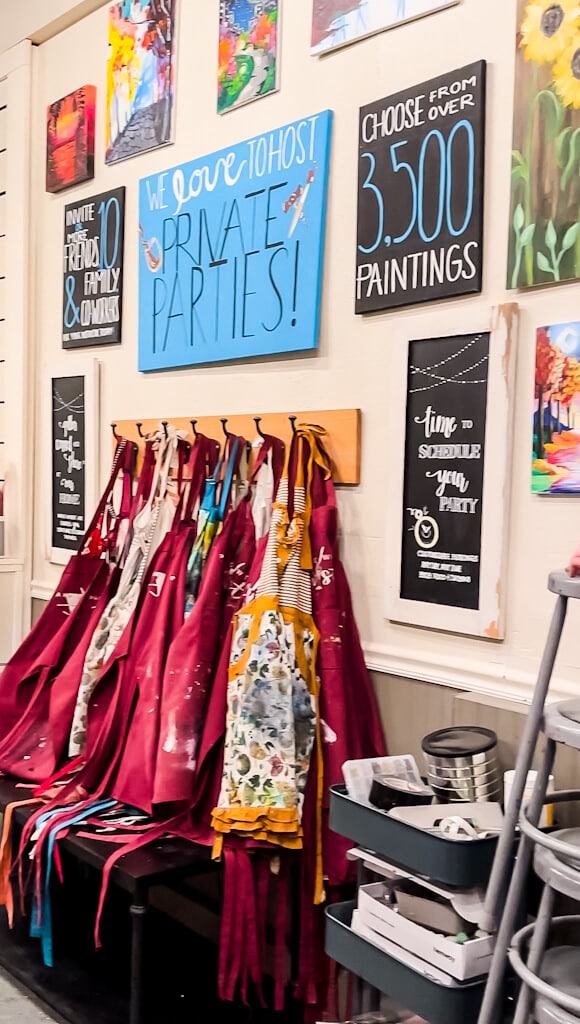 aprons and smocks hanging