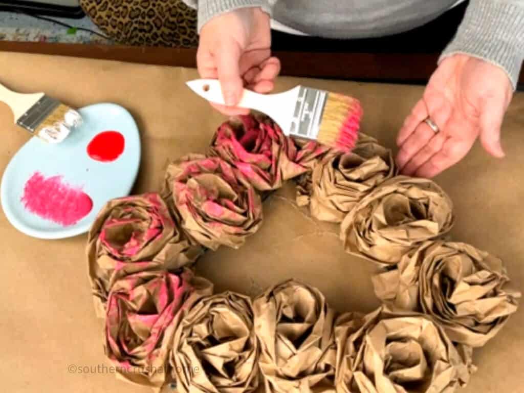 painting paper roses with pink and red paint