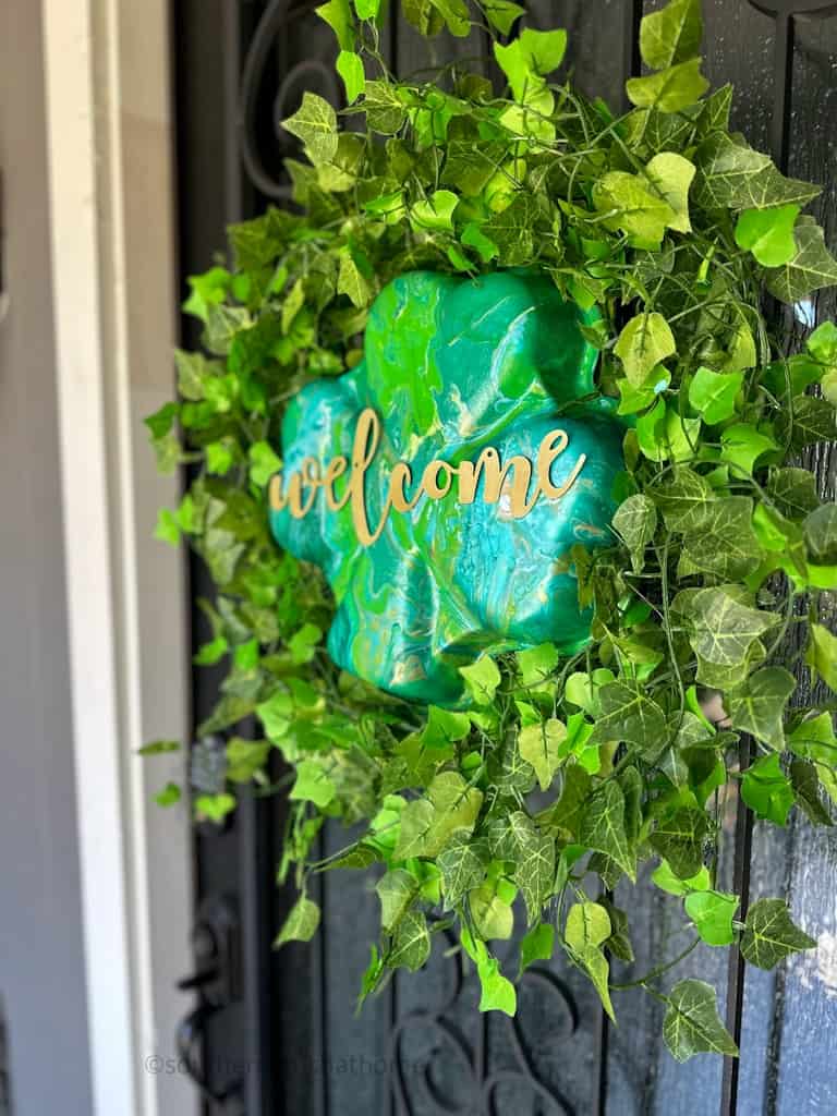side view of Acrylic Pour Painting on shamrock wreath