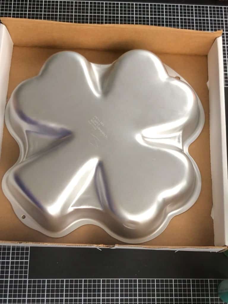 Shamrock Cake Pan in a cardboard box