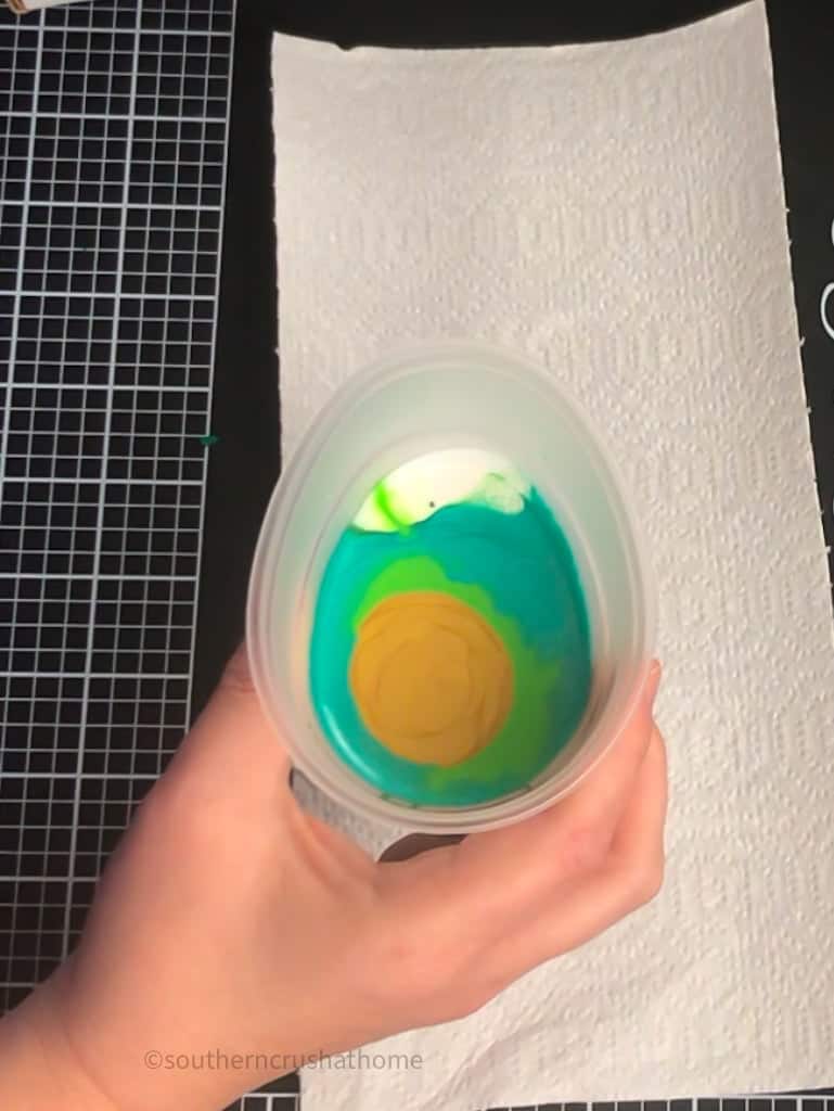 acrylic paint pouring paints mixed in one cup for dirty pour method