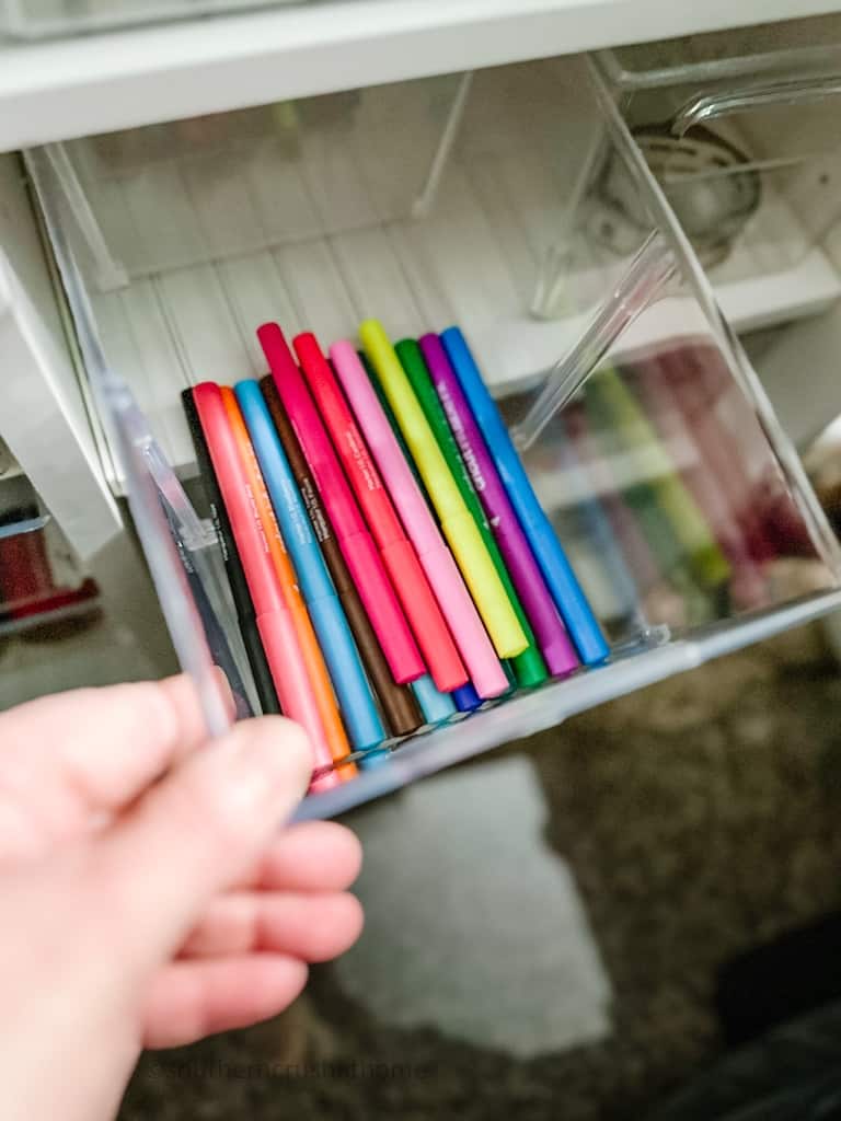 colorful markers in drawer
