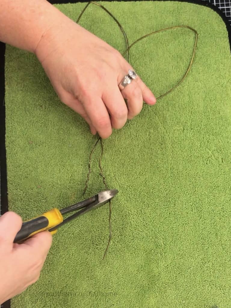 trimming end of coat hanger