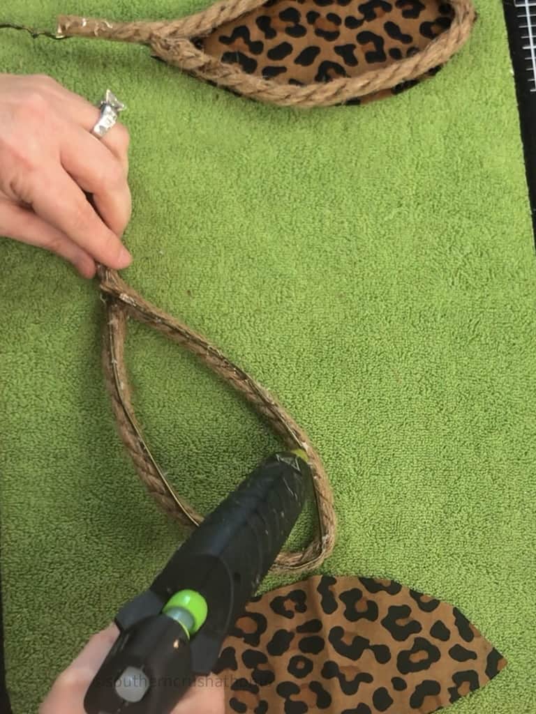 hot gluing fabric to coat hanger