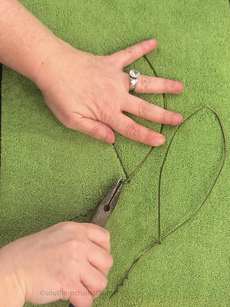 bending coat hanger with pliers