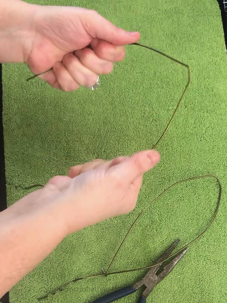 bending coat hanger into shape of bunny ears