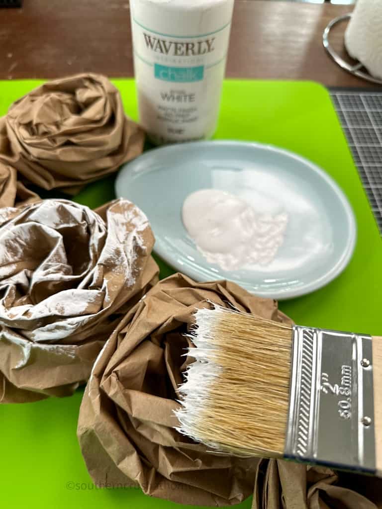 painting paper roses with white paint
