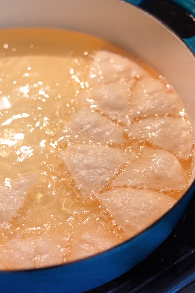 frying pan with oil and homemade corn tortilla chips