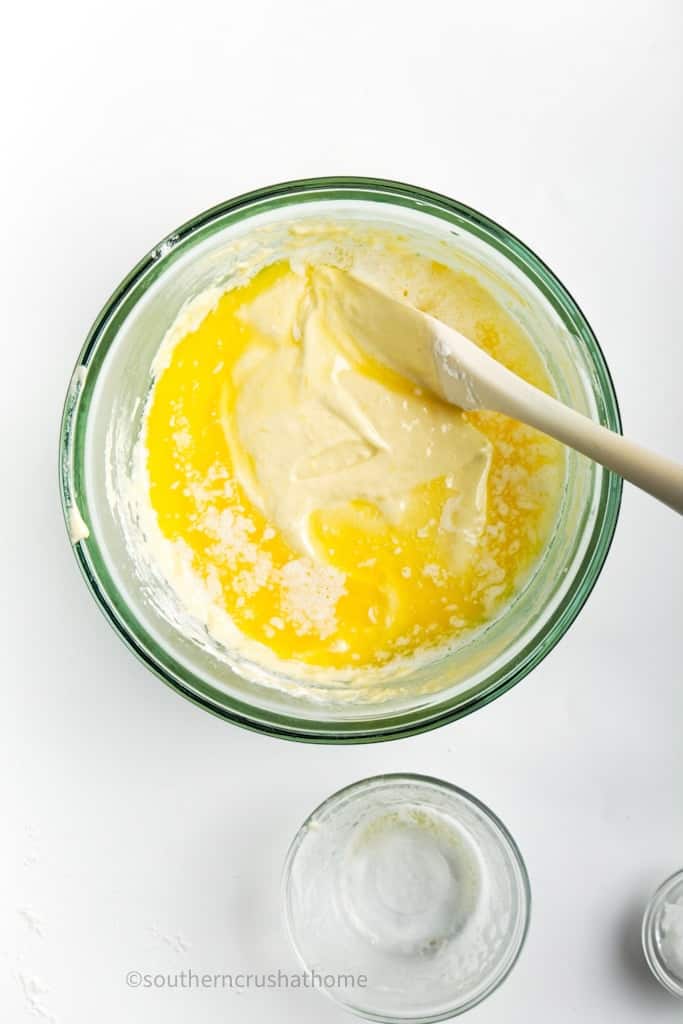 stirring in butter to Madeleine Cookie batter