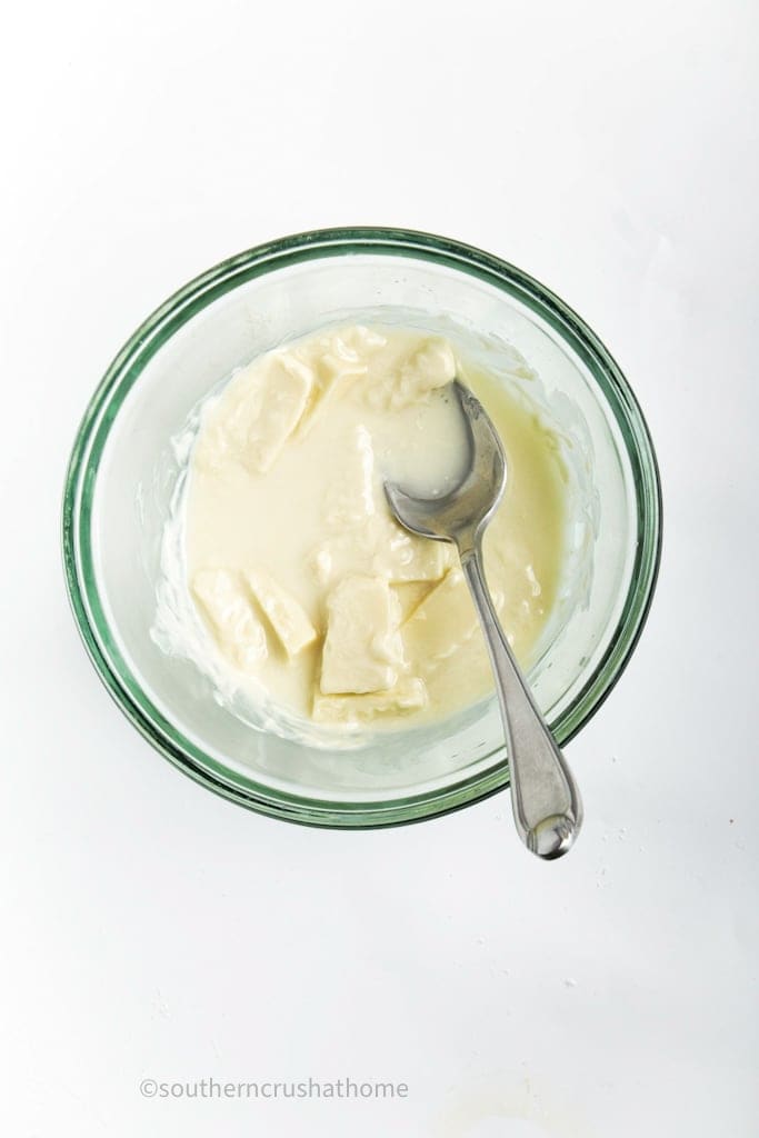 melted white chocolate with spoon