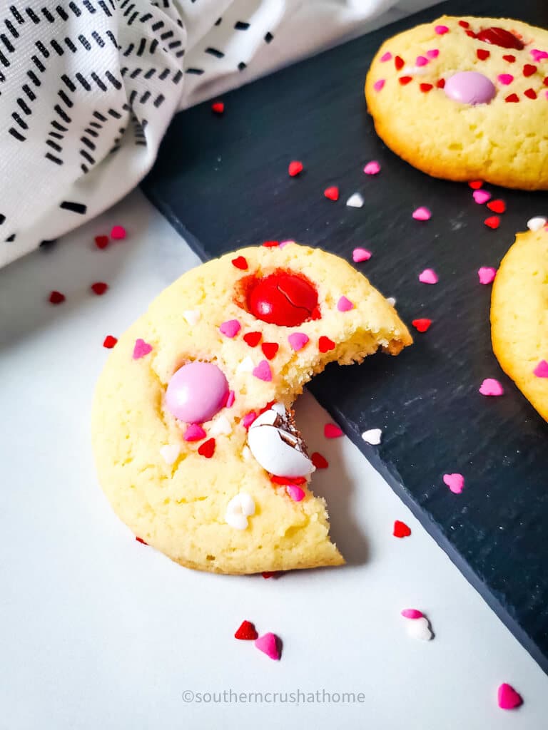 close up of bite out of yellow cake mix cookie