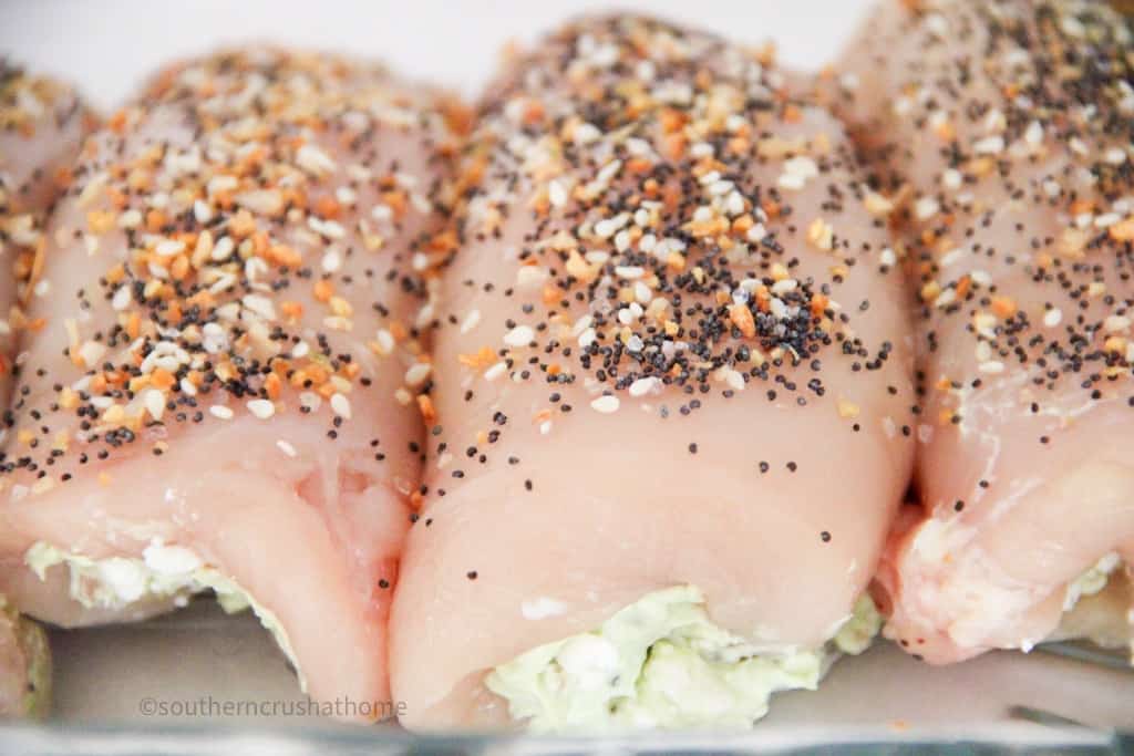 up close rolled up avocado chicken breasts in pan
