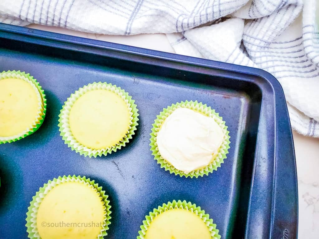 frosting the cupcakes