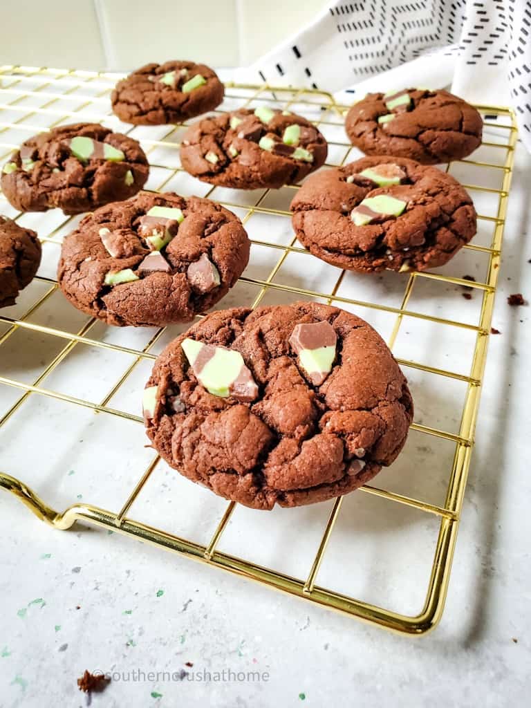 baked chocolate cake mix cookies on cooling rack