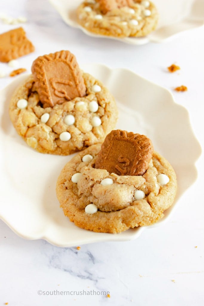 copycat crumbl biscoff cookies on a white platter