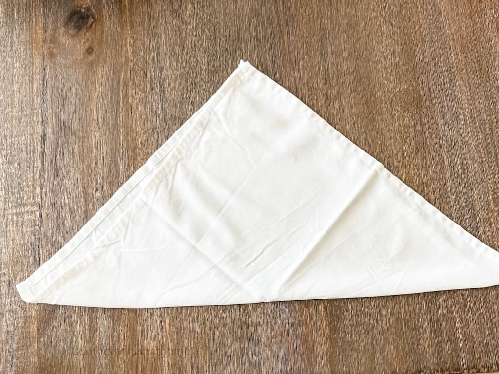 folding napkin in a triangle