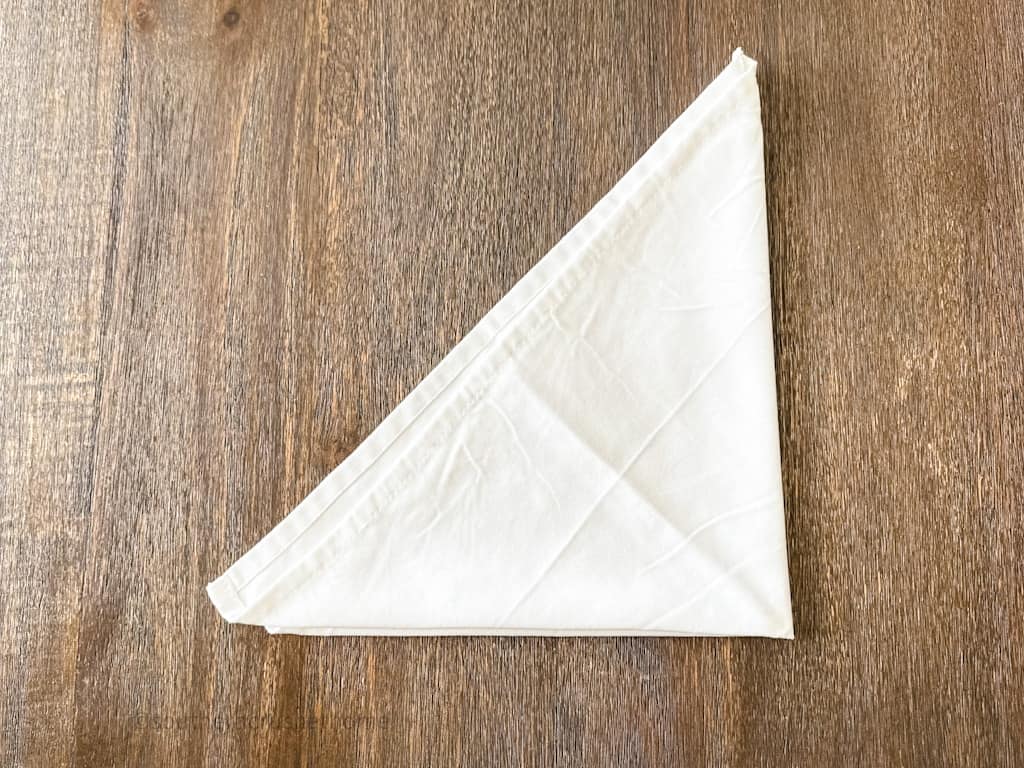 folding napkin in a triangle twice