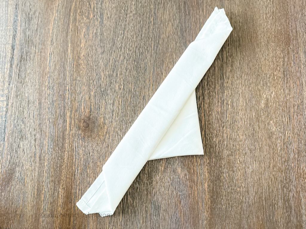 second fold of bunny napkin