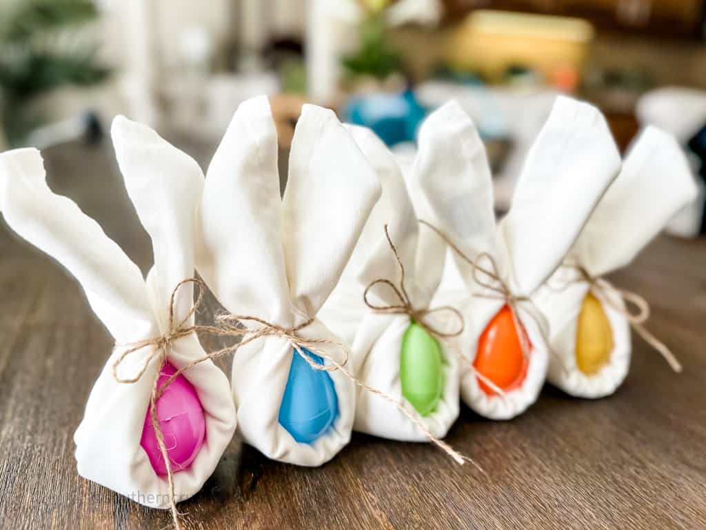 row of color easter bunny napkin folding idea