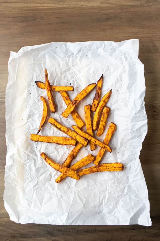 sweet potato fries draining on paper towel