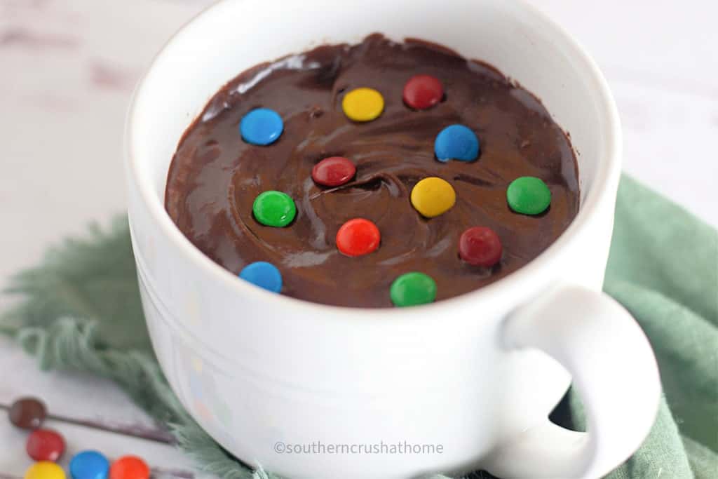 m&m's on top of chocolate mug cake