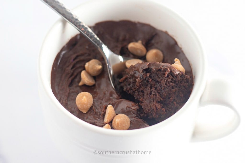 peanut butter chips on top of chocolate mug cake