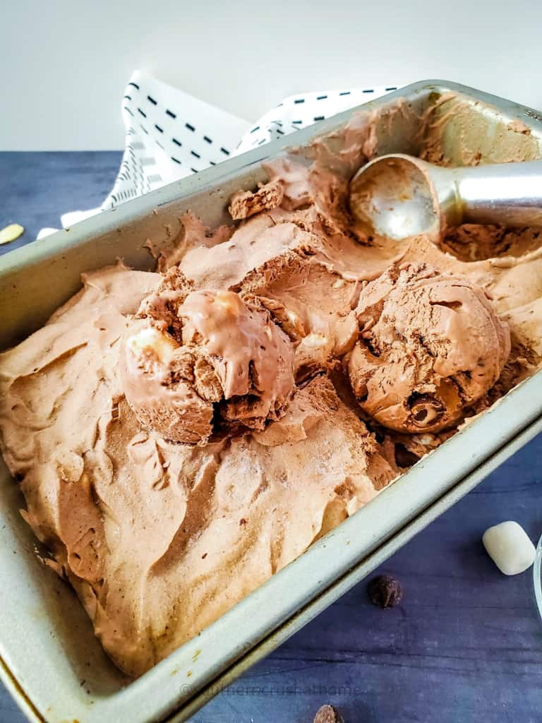 rocky road ice cream in pan with scooper
