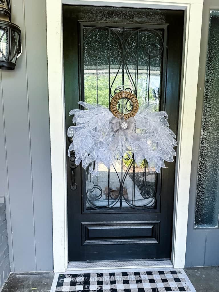Angel Wings Deco Mesh Wreath hanging on front door