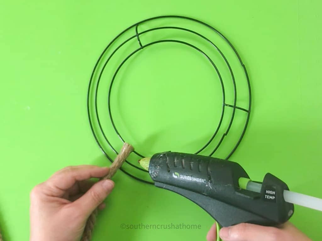 gluing rope down on wreath form