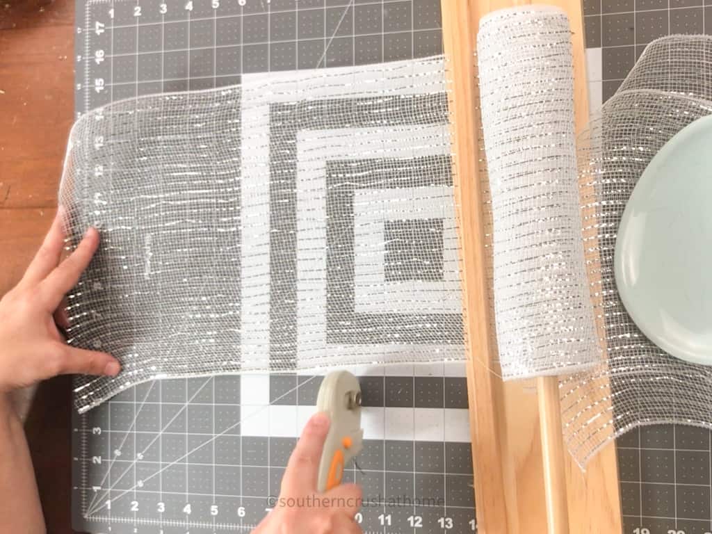 cutting 10" strips of 10" deco mesh