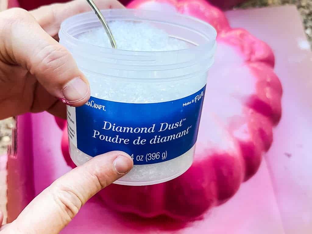 adding diamond dust to spray painted pumpkins