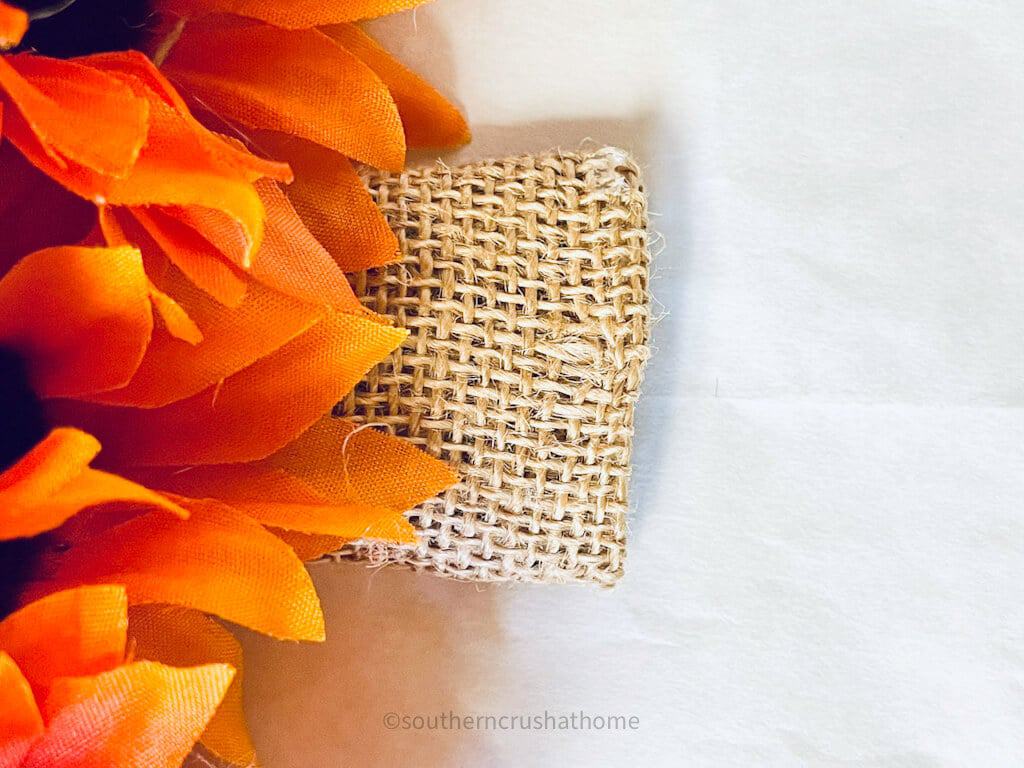 cover the pumpkin wreath form stem with burlap