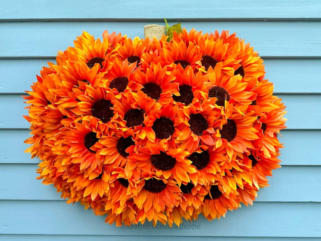 finished Dollar Tree Pumpkin Wreath with Dollar Tree Flowers