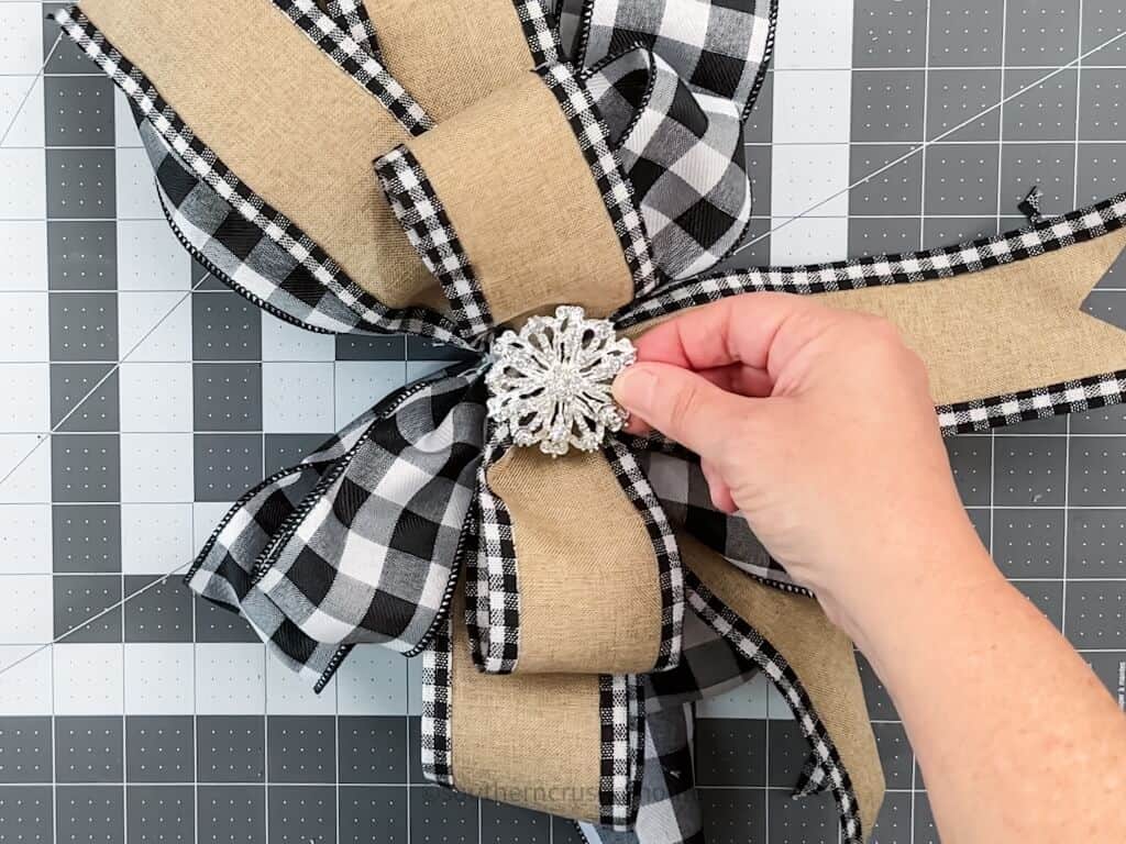 adding bling embellishment to a bow center