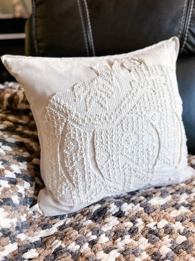 side view of fall pumpkin pillow diy vintage chenille bedspread