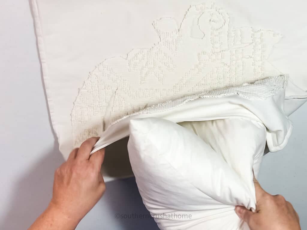 inserting pilow insert into pillow cover